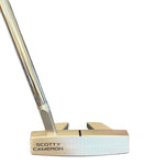 Scotty Cameron golf putter on a white background