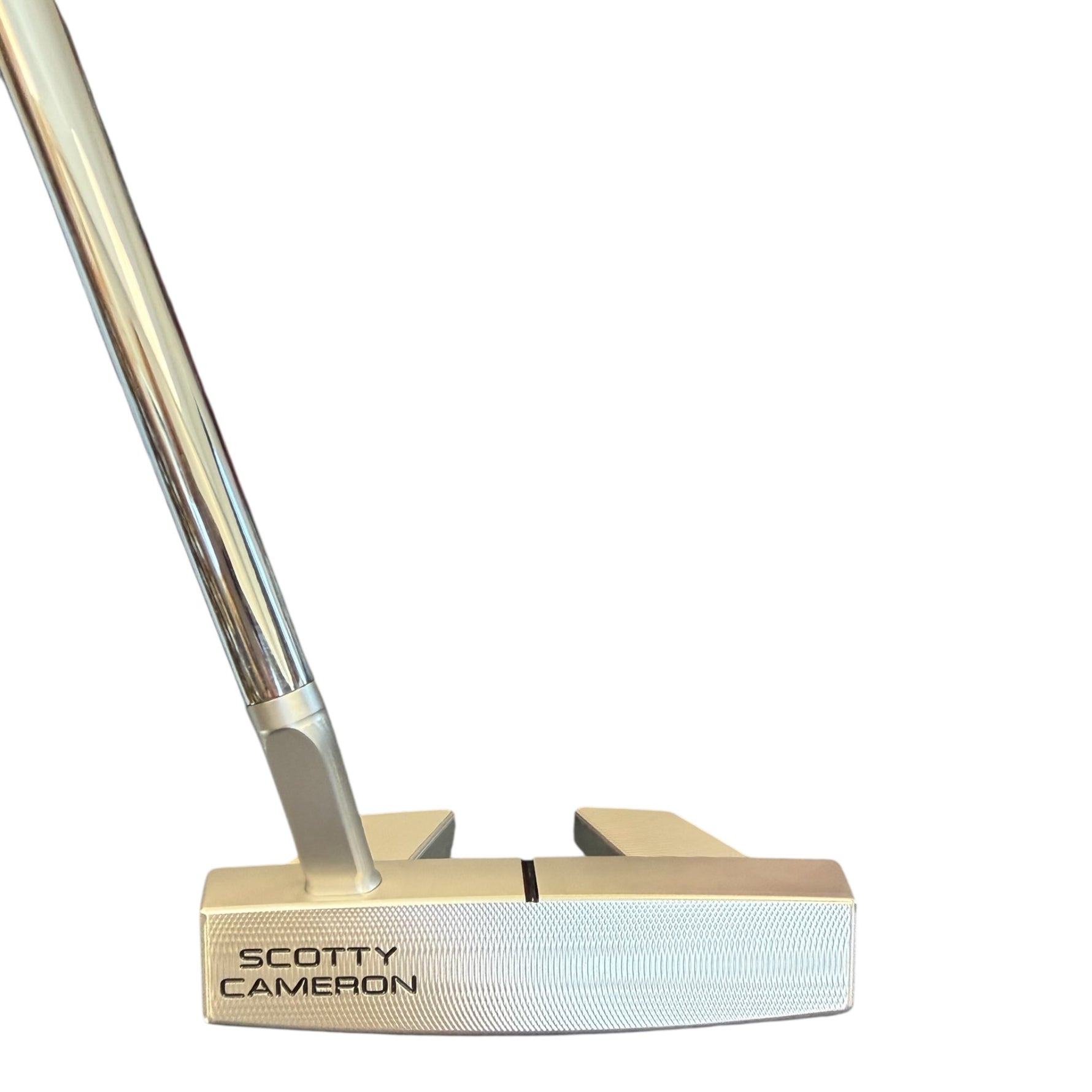 Scotty Cameron golf putter on a white background