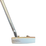 Scotty Cameron golf putter head on a white background