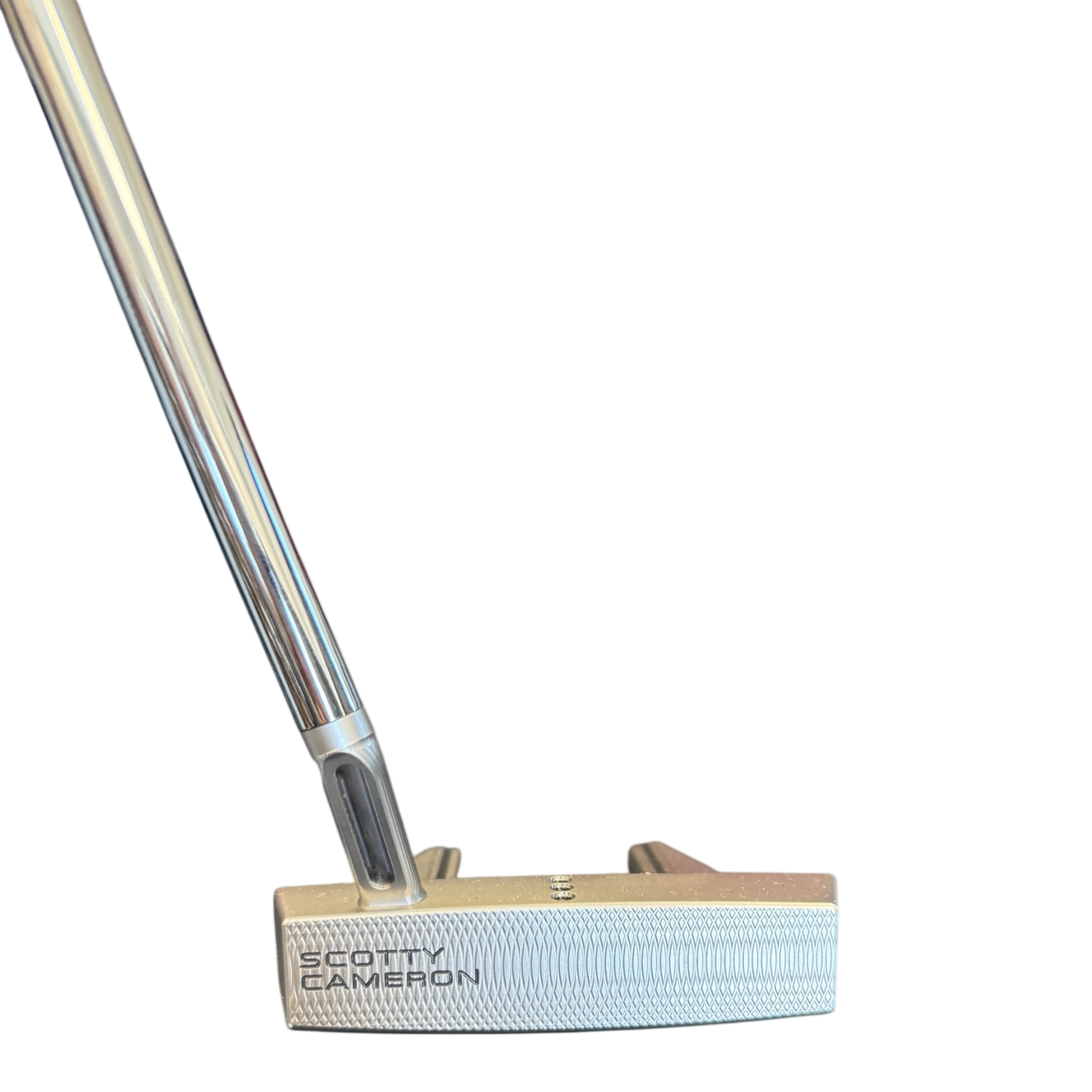 Scotty Cameron golf putter head on a white background