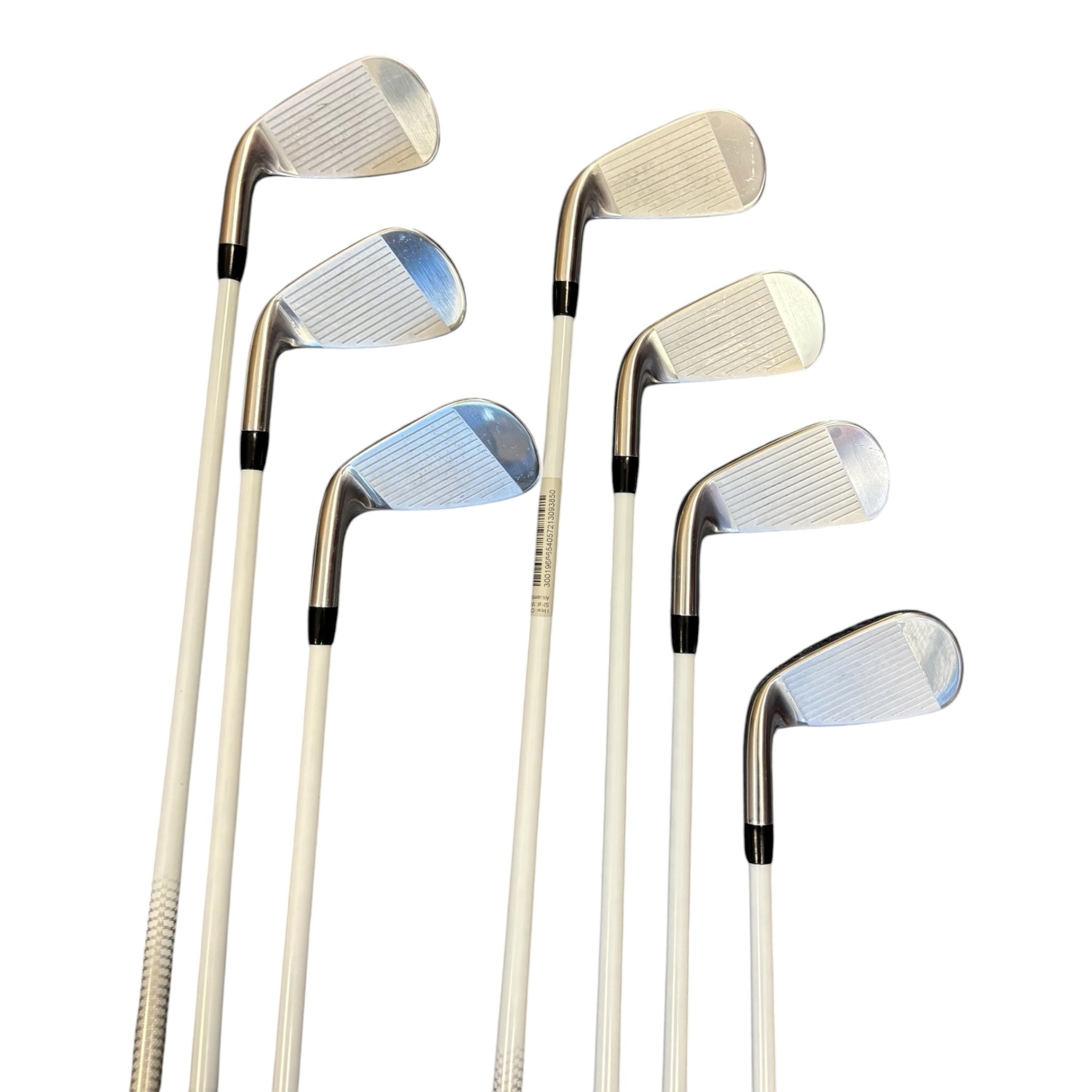 Set of golf clubs on a white background