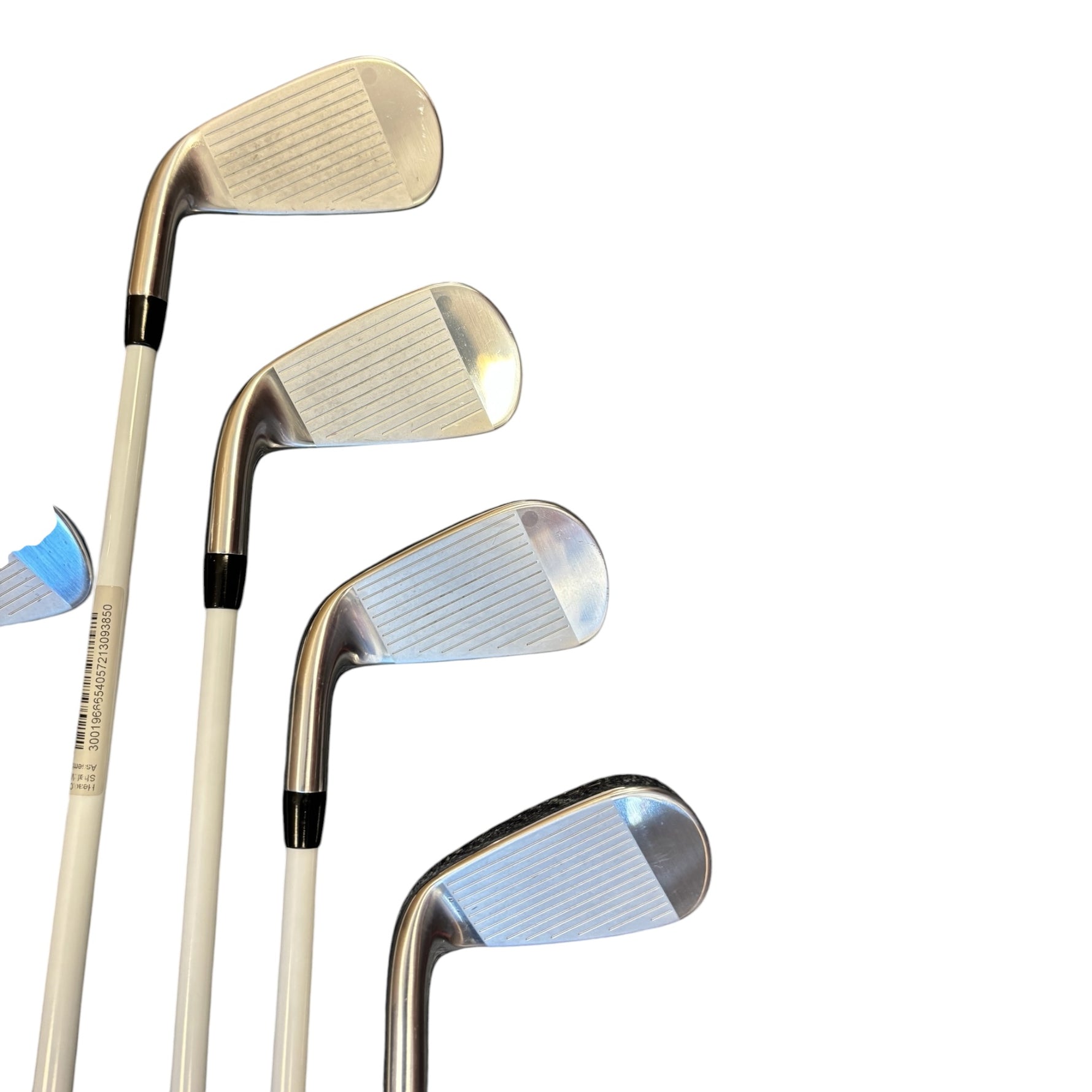 Set of golf clubs on a white background