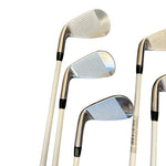 Set of golf clubs on a white background