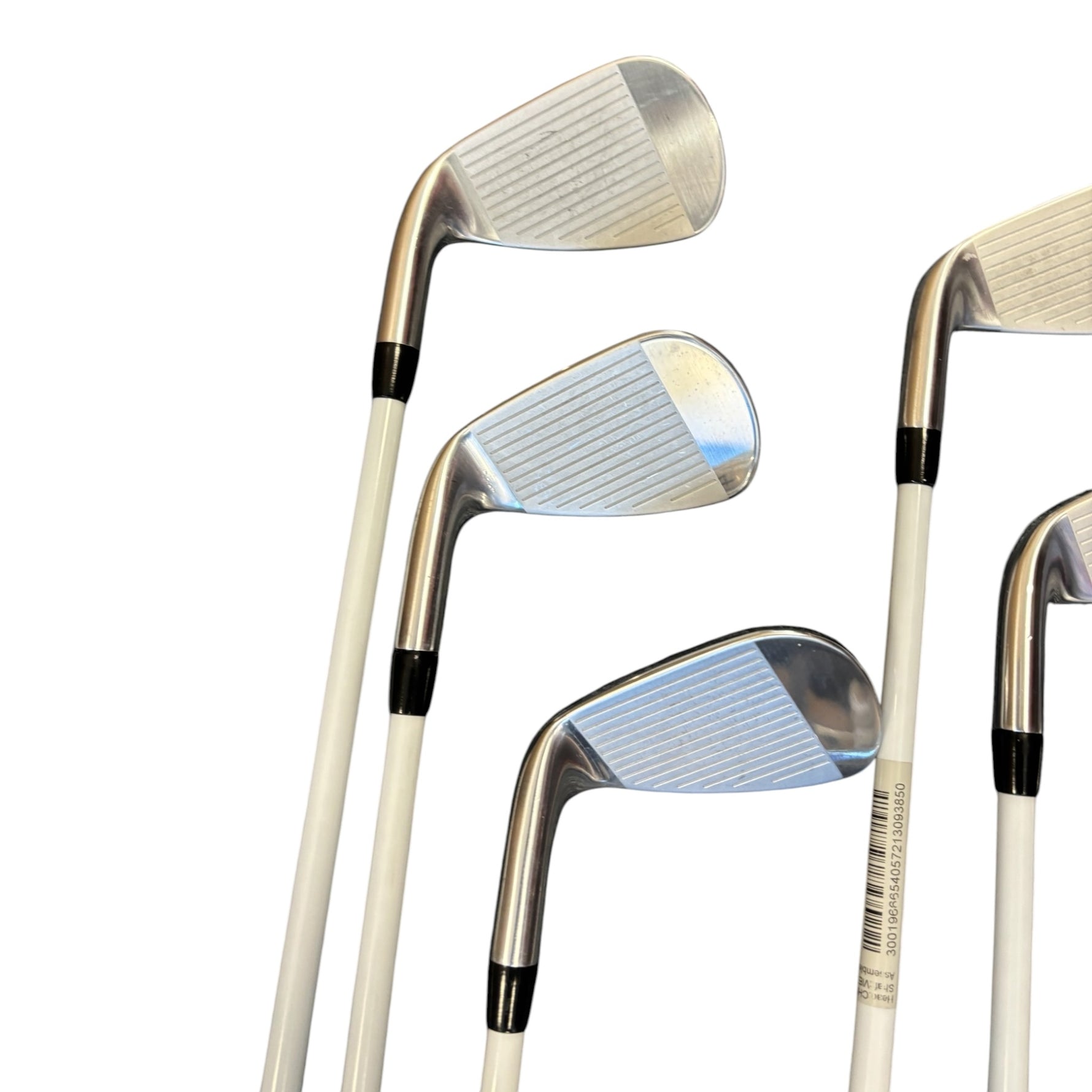 Set of golf clubs on a white background